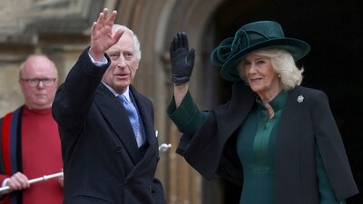 Britain's King Charles III, center, and Queen Camilla arrive to attend the Easter Matins Service at St. George's Chapel, Windsor Castle, England, Sunday, March 31, 2024. (Hollie Adams/Pool Photo via AP) (AP) Britain's King Charles III, center, and Queen Camilla arrive to attend the Easter Matins Service at St. George's Chapel, Windsor Castle, England, Sunday, March 31, 2024. (Hollie Adams/Pool Photo via AP) (AP)