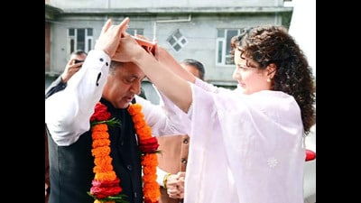 BJP candidate from Mandi Kangana Ranaut welcoming former chief minister Jai Ram Thakur at her native village Bhambla on Sunday. (Birbal Sharma/HT) BJP candidate from Mandi Kangana Ranaut welcoming former chief minister Jai Ram Thakur at her native village Bhambla on Sunday. (Birbal Sharma/HT)