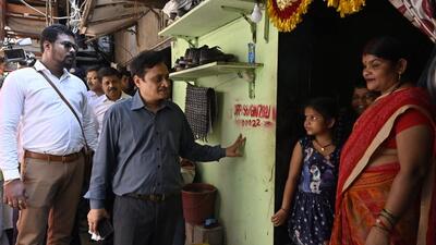 Mumbai, India - March 18, 2024 : SVR Srinivas, CEO of the Dharavi Redevelopment Project interacts with resident of Kamla Raman Nagar, as survey for Dharavi Redevelopment project begins today from Kamla Raman Nagar in Mumbai, India, on Monday, March 18, 2024. (Photo by Anshuman Poyrekar/ Hindustan Times) (Hindustan Times) Mumbai, India - March 18, 2024 : SVR Srinivas, CEO of the Dharavi Redevelopment Project interacts with resident of Kamla Raman Nagar, as survey for Dharavi Redevelopment project begins today from Kamla Raman Nagar in Mumbai, India, on Monday, March 18, 2024. (Photo by Anshuman Poyrekar/ Hindustan Times) (Hindustan Times)