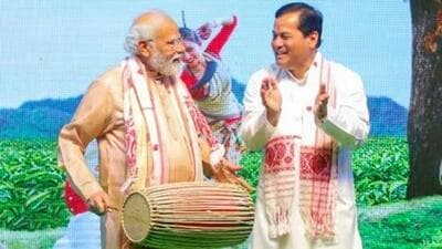 Prime Minister Narendra Modi plays Assamese Dhol during a Bihu function in Delhi in April 2022. (PTI File Photo) Prime Minister Narendra Modi plays Assamese Dhol during a Bihu function in Delhi in April 2022. (PTI File Photo)