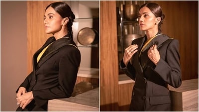 Taapsee's overcoat is from Alexander McQueen, and the silk saree is by Raw Mango. The amalgamation of international and Indian fashion serves as a tribute to the Alexander McQueen aesthetic. She styled the ensemble with embellished black pointed pumps from Jimmy Choo, statement silver earcuffs, and diamond rings. Meanwhile, her centre-parted sleek hairdo featuring multiple braids adorned with silver threads stole the show. (Instagram) Taapsee's overcoat is from Alexander McQueen, and the silk saree is by Raw Mango. The amalgamation of international and Indian fashion serves as a tribute to the Alexander McQueen aesthetic. She styled the ensemble with embellished black pointed pumps from Jimmy Choo, statement silver earcuffs, and diamond rings. Meanwhile, her centre-parted sleek hairdo featuring multiple braids adorned with silver threads stole the show. (Instagram)