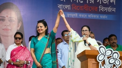 West Bengal CM and TMC chief Mamata Banerjee with party candidate Mahua Moitra at an election rally ahead of Lok Sabha polls at Dhubuliya in Nadia, on March 31. (PTI) West Bengal CM and TMC chief Mamata Banerjee with party candidate Mahua Moitra at an election rally ahead of Lok Sabha polls at Dhubuliya in Nadia, on March 31. (PTI)