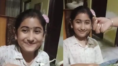 Snapshot of the young girl while she was cutting the cake. (X/@RaovarinderSin2) Snapshot of the young girl while she was cutting the cake. (X/@RaovarinderSin2)