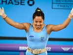 India's Mirabai Chanu reacts after winning the gold medal in the women's 49kg weightlifting category at the Commonwealth Games 2022