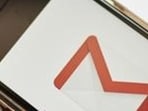The Google Inc. Gmail logo is displayed on an Apple Inc. iPhone. The Google Inc. Gmail logo is displayed on an Apple Inc. iPhone.