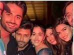 Kriti Sanon and sister Nupur Sanon with Kabir Bahia at a party; Kabir with Sakshi Dhoni at a match. (File Photos)