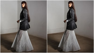 Her glamorous outfit features a shiny black blazer that fits her perfectly and shows off her curves. Teamed with a grey organza flared skirt, her outfit represents the perfect blend of colour and fabric. (Instagram/@mrunalthakur) Her glamorous outfit features a shiny black blazer that fits her perfectly and shows off her curves. Teamed with a grey organza flared skirt, her outfit represents the perfect blend of colour and fabric. (Instagram/@mrunalthakur)