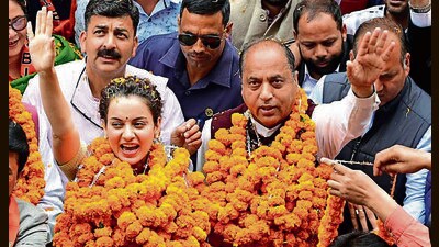 BJP Lok Sabha nominee from Mandi Kangana Ranaut with ex-CM Jai Ram Thakur n Mandi on Monday. (Birbal Sharma/HT) BJP Lok Sabha nominee from Mandi Kangana Ranaut with ex-CM Jai Ram Thakur n Mandi on Monday. (Birbal Sharma/HT)