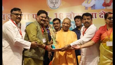 Chief minister Yogi Adityanath at the Prabuddh Jan Sammelan in Hathras on Monday. (HT Photo)
