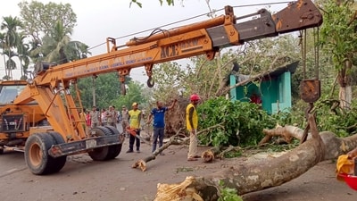 Strong winds accompanied by hail caused damage to several hutments and houses. Trees were uprooted, and electric poles came crashing down in most parts of the district headquarters town and many areas of neighbouring Mainaguri on Sunday. (PTI) Strong winds accompanied by hail caused damage to several hutments and houses. Trees were uprooted, and electric poles came crashing down in most parts of the district headquarters town and many areas of neighbouring Mainaguri on Sunday. (PTI)