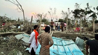 Houses are damaged and electric poles fell after a heavy storm that left at least five people dead, in Jalpaiguri, West Bengal, on March 31. (PTI) Houses are damaged and electric poles fell after a heavy storm that left at least five people dead, in Jalpaiguri, West Bengal, on March 31. (PTI)