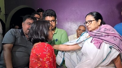 Chief Minister Mamata Banerjee rushed to the district late on Sunday night and assured the people of all help from the administration. (PTI) Chief Minister Mamata Banerjee rushed to the district late on Sunday night and assured the people of all help from the administration. (PTI)