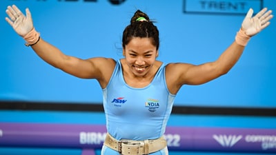 India's Mirabai Chanu reacts after winning the gold medal in the women's 49kg weightlifting category at the Commonwealth Games 2022 (PTI) India's Mirabai Chanu reacts after winning the gold medal in the women's 49kg weightlifting category at the Commonwealth Games 2022 (PTI)