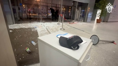 Shattered glass lies at the scene of the deadly shooting attack in Crocus City Hall, in Krasnogorsk, Moscow Region, on March 23. (Reuters)