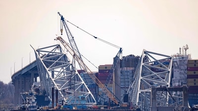 The collapse killed six people and blocked traffic through the busy US port. (Getty Images via AFP) The collapse killed six people and blocked traffic through the busy US port. (Getty Images via AFP)