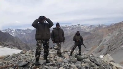 Indian soldiers tracking the movement of troops across the Line of Actual Control in China. Indian soldiers tracking the movement of troops across the Line of Actual Control in China.