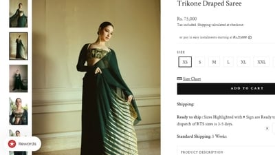 Tamannaah's House of Masaba saree is called the Trikone Draped Saree. Adding it to your collection will cost you <span class='webrupee'>₹</span>75,000. (houseofmasaba.com) Tamannaah's House of Masaba saree is called the Trikone Draped Saree. Adding it to your collection will cost you <span class='webrupee'>₹</span>75,000. (houseofmasaba.com)