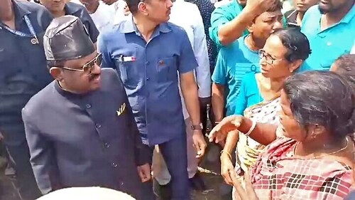 West Bengal Governor CV Ananda Bose interacts with the storm-affected people, in Jalpaiguri on Monday. (ANI Photo) (ANI) West Bengal Governor CV Ananda Bose interacts with the storm-affected people, in Jalpaiguri on Monday. (ANI Photo) (ANI)