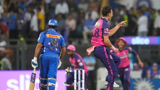Rajasthan Royals' Trent Boult celebrates the dismissal of Mumbai Indians' Rohit Sharma (AP)