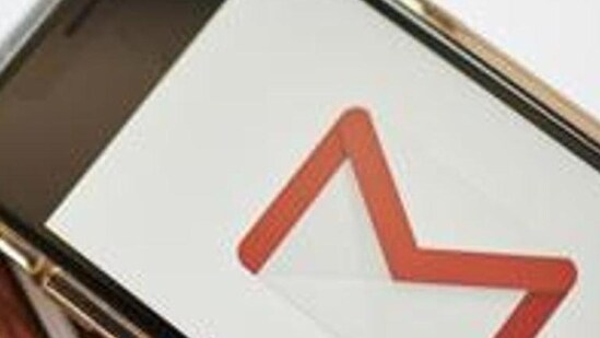 The Google Inc. Gmail logo is displayed on an Apple Inc. iPhone. (Bloomberg)
