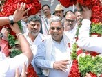 Karnataka Chief Minister Siddaramaiah with State Deputy Chief Minister DK Shivakumar being garlanded in Bengaluru. (ANI Photo) Karnataka Chief Minister Siddaramaiah with State Deputy Chief Minister DK Shivakumar being garlanded in Bengaluru. (ANI Photo)