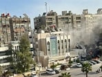 Dense smoke billows out after the Consular Section of Iranian Embassy in the Syrian capital of Damascus is destroyed by Israeli airstrikes, in Damascus on Tuesday. Reportedly at least eight people killed and several others injured. (ANI Photo)
