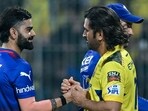 Chennai Super Kings' captain Ruturaj Gaikwad and teammate MS Dhoni (R) enter the field during the Indian Premier League (IPL) Twenty20 cricket match Chennai Super Kings' captain Ruturaj Gaikwad and teammate MS Dhoni (R) enter the field during the Indian Premier League (IPL) Twenty20 cricket match