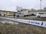 Finnish police officers guard the scene behind police tapes at the primary Viertola comprehensive school where a child opened fire and injured three other children, on April 2, 2024 in Vantaa, outside the Finnish capital Helsinki. Police said, that the attacker was in custody, and "All those involved in the shooting incident are minors". Finnish police officers guard the scene behind police tapes at the primary Viertola comprehensive school where a child opened fire and injured three other children, on April 2, 2024 in Vantaa, outside the Finnish capital Helsinki. Police said, that the attacker was in custody, and "All those involved in the shooting incident are minors".