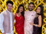 Nick Jonas, Priyanka Chopra, Siddharth Chopra and Neelam Upadhyaya pose for a photo.