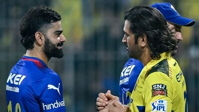 Chennai Super Kings' captain Ruturaj Gaikwad and teammate MS Dhoni (R) enter the field during the Indian Premier League (IPL) Twenty20 cricket match (AFP) Chennai Super Kings' captain Ruturaj Gaikwad and teammate MS Dhoni (R) enter the field during the Indian Premier League (IPL) Twenty20 cricket match (AFP)