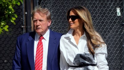 Republican presidential candidate former President Donald Trump and former first lady Melania Trump arrive to vote in the Florida primary election in Palm Beach, Fla., Tuesday, March 19, 2024. (AP Photo/Wilfredo Lee) (AP)