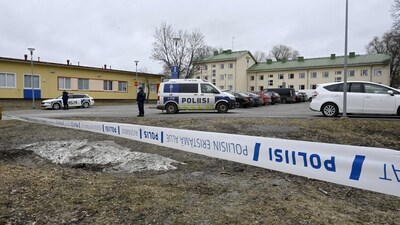 Finnish police officers guard the scene behind police tapes at the primary Viertola comprehensive school where a child opened fire and injured three other children, on April 2, 2024 in Vantaa, outside the Finnish capital Helsinki. Police said, that the attacker was in custody, and "All those involved in the shooting incident are minors". (AFP) Finnish police officers guard the scene behind police tapes at the primary Viertola comprehensive school where a child opened fire and injured three other children, on April 2, 2024 in Vantaa, outside the Finnish capital Helsinki. Police said, that the attacker was in custody, and "All those involved in the shooting incident are minors". (AFP)
