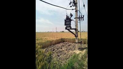 PSPCL advised farmers to create a buffer of 10 meters around poles to avert a disaster. (HT photo)