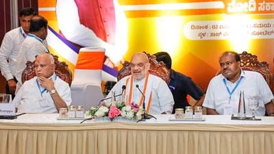 Union Home Minister Amit Shah with BJP leader B.S. Yediyurappa and Janata Dal (Secular) leader HD Kumaraswamy during a meeting ahead of Lok Sabha elections, in Bengaluru. (PTI) Union Home Minister Amit Shah with BJP leader B.S. Yediyurappa and Janata Dal (Secular) leader HD Kumaraswamy during a meeting ahead of Lok Sabha elections, in Bengaluru. (PTI)