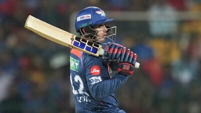 LSG earlier dominated the RCB bowlers for much of their innings but the latter made a comeback in the final overs. Quinton de Kock smashed 81 off 56 balls but he fell to Reece Topley in the 17th over. (PTI) LSG earlier dominated the RCB bowlers for much of their innings but the latter made a comeback in the final overs. Quinton de Kock smashed 81 off 56 balls but he fell to Reece Topley in the 17th over. (PTI)
