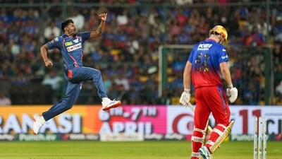 Lucknow Super Giants's Mayank Yadav celebrates after taking the wicket of Royal Challengers Bengaluru batter Cameron Green (PTI) Lucknow Super Giants's Mayank Yadav celebrates after taking the wicket of Royal Challengers Bengaluru batter Cameron Green (PTI)