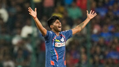 Du Plessis was run out off the first ball of Mayank's over. Glenn Maxwell was then bounced out in that same over. (PTI) Du Plessis was run out off the first ball of Mayank's over. Glenn Maxwell was then bounced out in that same over. (PTI)
