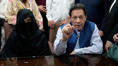Pakistan's former Prime Minister Imran Khan, right, and Bushra Bibi,his wife. (AP/File) Pakistan's former Prime Minister Imran Khan, right, and Bushra Bibi,his wife. (AP/File)
