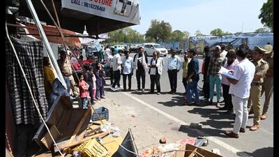 People gathered at the accident site in Lucknow on Tuesday. (HT Photo) People gathered at the accident site in Lucknow on Tuesday. (HT Photo)