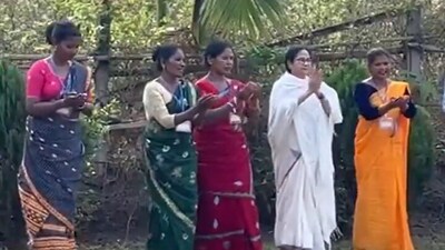 Mamata Banerjee was seen dancing with tribals in Jalpaiguri district on Tuesday. (ANI)