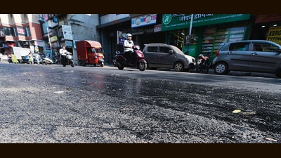 The newly made asphalt stretch between Tilak Chowk and Narayan Peth ended up melting due to heat. (MAHENDRA KOLHE/ HT PHOTO) The newly made asphalt stretch between Tilak Chowk and Narayan Peth ended up melting due to heat. (MAHENDRA KOLHE/ HT PHOTO)