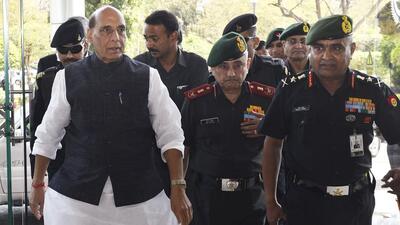 Union defence minister Rajnath Singh with Chief of Defence Staff General Anil Chauhan (middle) and Indian Army chief General Manoj Pande at the Manekshaw Auditorium in New Delhi on Tuesday. (ANI Photo) Union defence minister Rajnath Singh with Chief of Defence Staff General Anil Chauhan (middle) and Indian Army chief General Manoj Pande at the Manekshaw Auditorium in New Delhi on Tuesday. (ANI Photo)