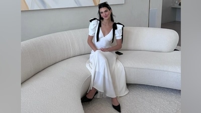 Kendall's midi dress comes in a pristine white hue. The 28-year-old's sensual elegance shined through the ensemble as she embraced the two viral trends of this season - the coquette core and the bow trend. The coquette core is about embracing your feminine side with frilly bows, flirty florals, and plenty of pinks. Meanwhile, Kendall incorporated both aesthetics in her look in a stylish yet unusual way. (Instagram) Kendall's midi dress comes in a pristine white hue. The 28-year-old's sensual elegance shined through the ensemble as she embraced the two viral trends of this season - the coquette core and the bow trend. The coquette core is about embracing your feminine side with frilly bows, flirty florals, and plenty of pinks. Meanwhile, Kendall incorporated both aesthetics in her look in a stylish yet unusual way. (Instagram)