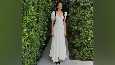 Coming to the design elements of Kendall's white midi dress, it features a plunging V neckline highlighting her decolletage, puffed half-length shoulders, a fitted bodice accentuating the supermodel's toned frame, frilled ankle-length silk skirt attached to the waist, an empire waistline, a ply crepe overlay, and a back zip closure. (Instagram) Coming to the design elements of Kendall's white midi dress, it features a plunging V neckline highlighting her decolletage, puffed half-length shoulders, a fitted bodice accentuating the supermodel's toned frame, frilled ankle-length silk skirt attached to the waist, an empire waistline, a ply crepe overlay, and a back zip closure. (Instagram)
