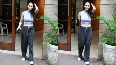 The paparazzi pictures show Malaika Arora exiting her Mumbai residence. For the occasion, Malaika kept her off-duty look simple. She wore a basic crop solid colour crop top and relaxed-fit jogger pants. No accessories added a laidback vibe to her OOTD (outfit of the day). (HT Photo/Varinder Chawla) The paparazzi pictures show Malaika Arora exiting her Mumbai residence. For the occasion, Malaika kept her off-duty look simple. She wore a basic crop solid colour crop top and relaxed-fit jogger pants. No accessories added a laidback vibe to her OOTD (outfit of the day). (HT Photo/Varinder Chawla)