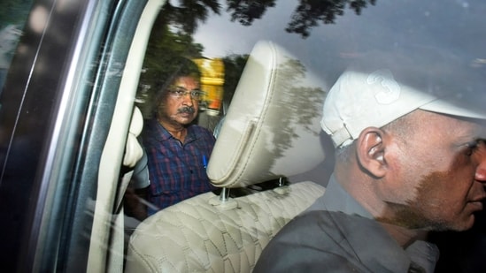 Arvind Kejriwal leaves in a car after attending a hearing at a court, in New Delhi. Arvind Kejriwal leaves in a car after attending a hearing at a court, in New Delhi.