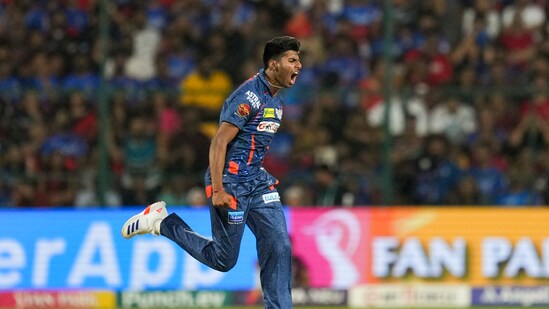 Mayank Yadav was the toast of the evening as he flattened Royal Challengers Bengaluru in their chase of a target of 182. Mayank recorded figures of 3/14 as RCB were all out for 153 in reply to LSG's 181/5(PTI)