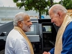Prime Minister Narendra Modi with US President Joe Biden at Mahatma Gandhi's memorial Rajghat on the final day of the G20 Summit, in New Delhi (PTI)