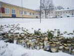 Candles and flowers are placed in front of the Viertola School to pay tribute to victims in Vantaa, in the north of the Finnish capital Helsinki. (AFP) Candles and flowers are placed in front of the Viertola School to pay tribute to victims in Vantaa, in the north of the Finnish capital Helsinki. (AFP)