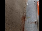 Snapshot of the railway station floor with paan stains. 